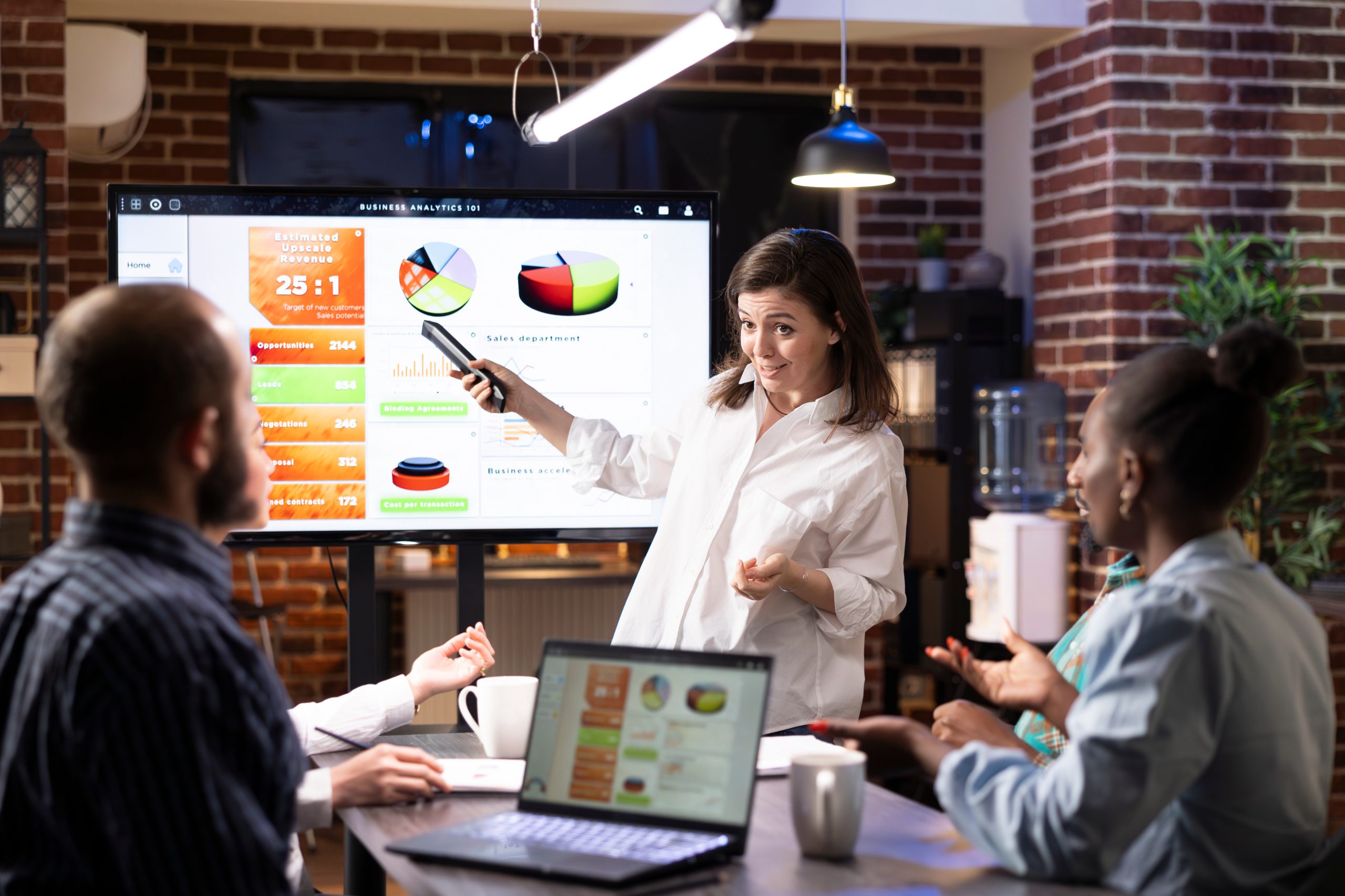 Business woman analyzing data analytics representing the Top IT Company in Qatar. Business woman analyzing data analytics representing the Top IT Company in Qatar.